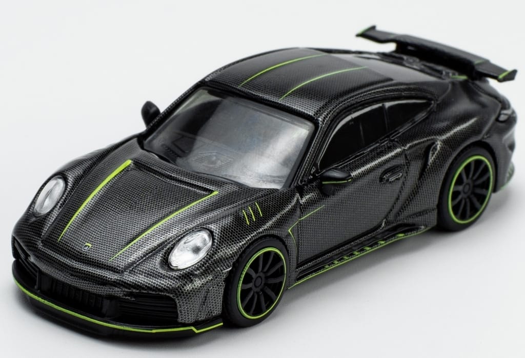 駿河屋 -<新品/中古>1/64 992 STINGER GTR CARBON EDITION [PR640017 ...